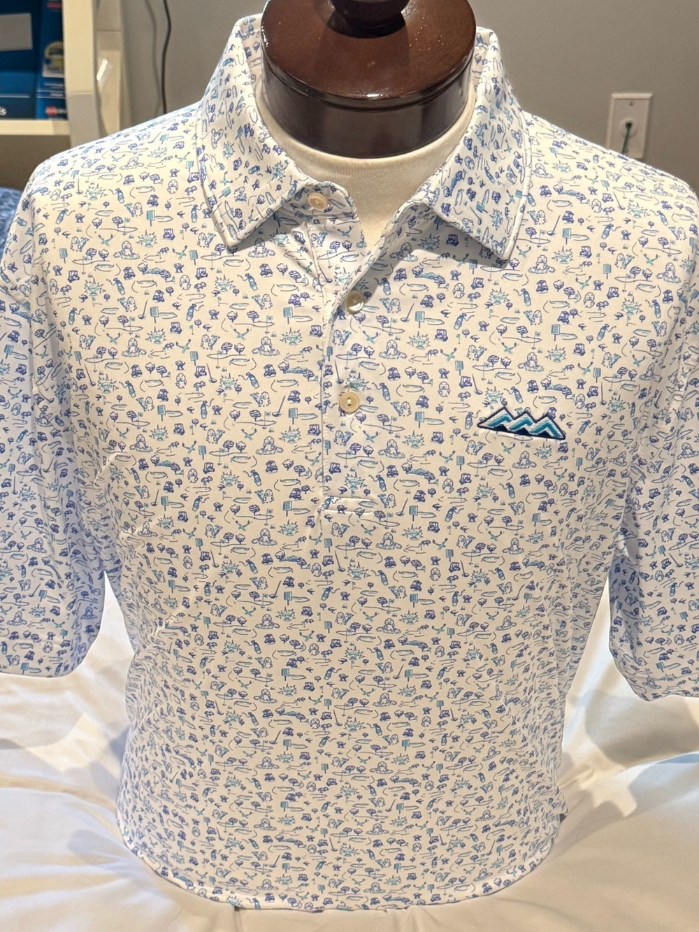 Peter Millar White Polo with Light Blue Caddyshack Pattern